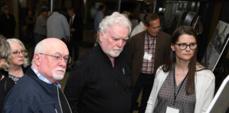 
			
				                                Engineer Rachel Tereska, right, was posted by large renderings of the Fort Jenkins (Spc. Dale Kridlo Memorial) Bridge and the Water Street (Firefighters Memorial) Bridge to answer any questions from the public prior to the main meeting of the evening.
                                 Tony Callaio | For Times Leader

			
		