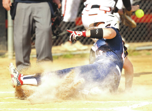 128487310_web1_pit_tunk1_faa-copy
Pittstons Tori Para slides into home plate to score the first Pittston score against Tunkhannock Monday afternoon.
Fred Adams | For Sunday Dispatcj