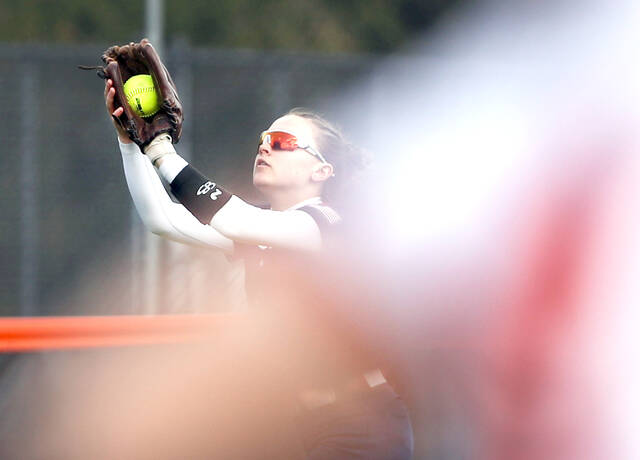 <p>Pittston out fielder Maura Mihalk catches a fly ball as Tunkhannocks Ella McNeff tries to run to first base in the opening inning of play Monday in Tunkhannock.</p>
<p>Fred Adams | For Sunday Dispatcj</p>