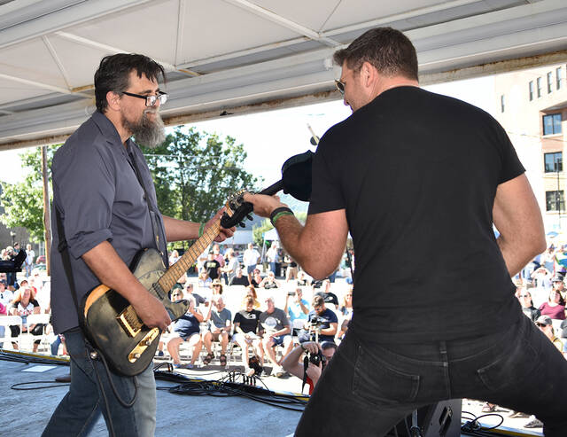 <p>Sunday Dispatch file photo</p>
<p>Dupont resident and founding member of national recording act, The Badlees, Bret Alexander, left, plays alongside violinist Nyke Van Wyk during the inaugral Pittston Prohibition music fest.</p>
<p>Sunday Dispatch file photo</p>