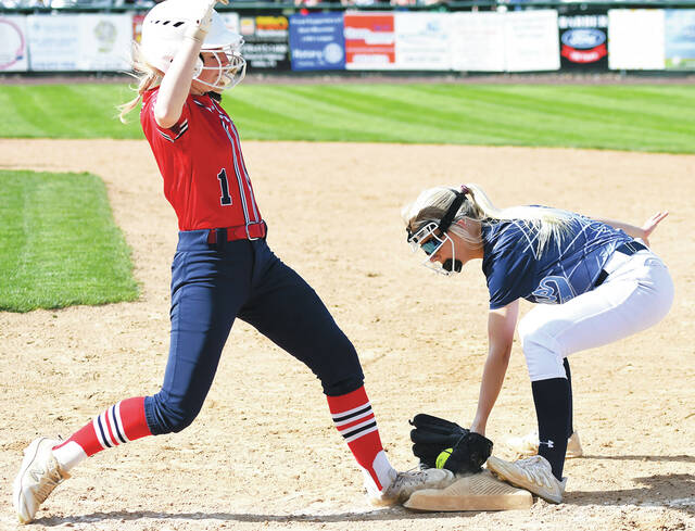 <p>Dallas second baseman Jordan Porasky gets to first base before Pittston Area’s Kallie Booth (1) for the forceout in a bunt attempt.</p>
<p>Tony Callaio | For Sunday Dispatch</p>
