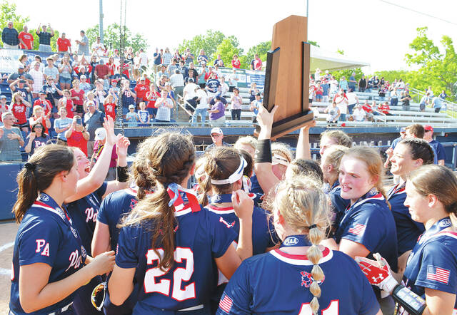 128623070_web1_PA-Armstrong-State-5A-Final-12
Pittston Area softball players celebrate with the state championship trophy the first won by the school in any team sport after defeating Armstrong in Thursdays PIAA Class 5A finals at Penn State.
Tony Callaio | For Sunday Dispatch
