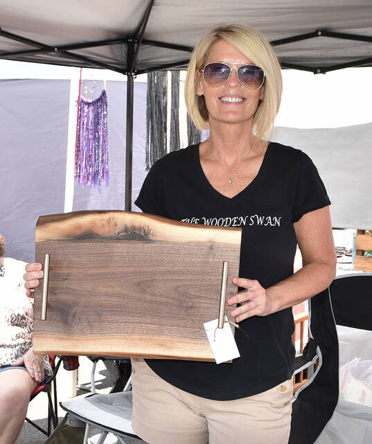 <p>Michelle Galli, of The Wooden Swan, displays of her wooden trays at the inaugral PIttston’s Day Downtown. </p>
<p>Tony Callaio | For Sunday Dispatch</p>