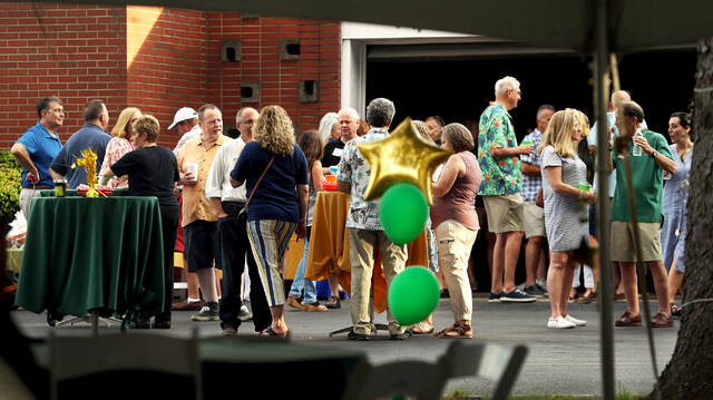 <p>Members of the Wyoming Area Class of 1982 mingled together after the Mass at the Oblates of St Joseph Chapel in Jenkins Township.</p>
<p>Fred Adams | For Sunday Dispatch</p>
