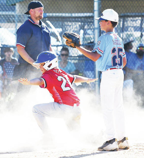 <p>Mountain Top’s Teddy Taylor (20) declares him safe at home after being called safe by the home plate umpire.</p>
                                 <p>Tony Callaio | For Sunday Dispatch</p>