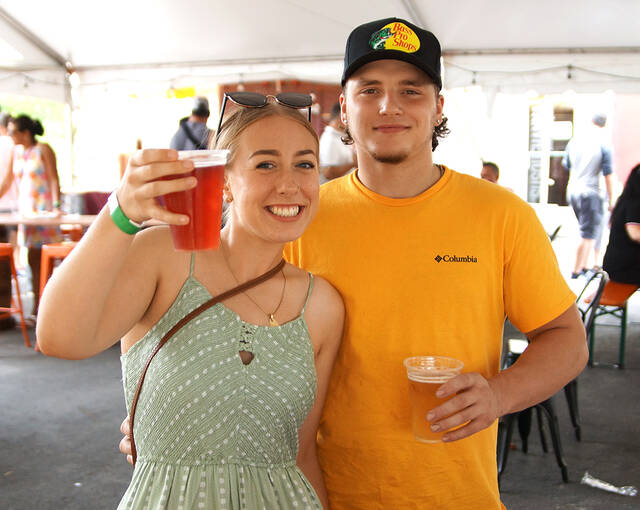 128726330_web1_GPSS-Christmas-in-July-2
Ilana Cunningham and Jacob Gall enjoy the Sunday afternoon Christmas in July event sponsored by the Greater Pittston Santa Squad at the Susquehanna Brewing Co.
Tony Callaio | For Sunday Dispatch