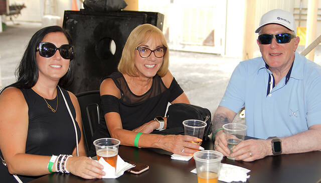<p>Happy to be at the Greater Pittston Santa Squad Christmas in July party at Susquehanna Brewing Co. is, left to right, Alana, Debbie, and Dr. Gene DiMinico.</p>
<p>Tony Callaio | For Sunday Dispatch</p>