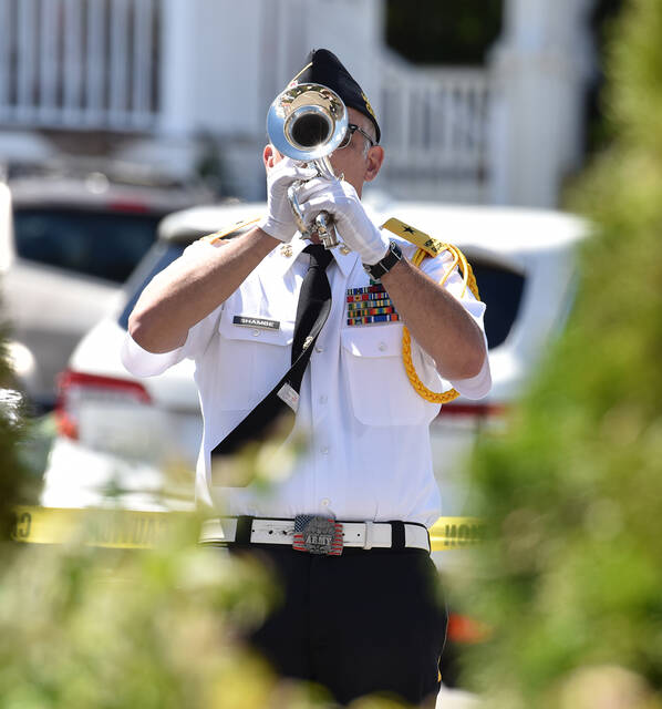 <p>Taps was offered by the Honor Guard of AmVets Post 189 during the Daniel Romanko and Michael Clifford memorial service at Avoca Municipal Building on Saturday, July 30, 2022.</p>
<p>Tony Callaio | For Sunday Dispatch</p>