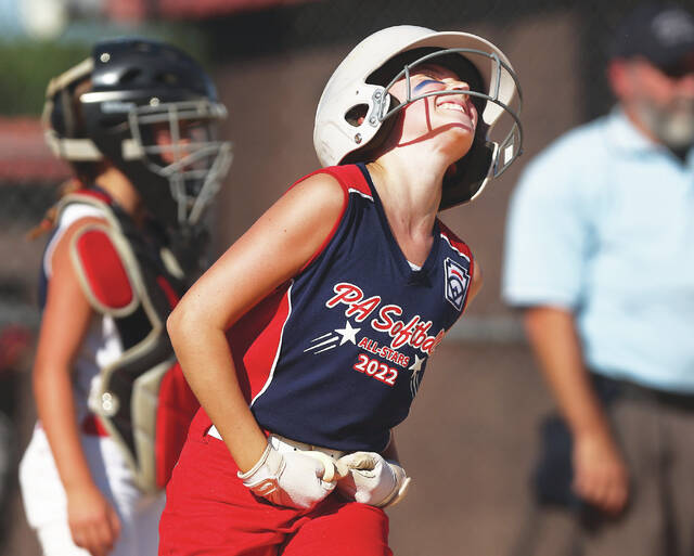 <p>Pittston Area’s Natalie McAndrew reacts to scoring her team’s first run in the first inning against Delaware during a Little League 8-10 Softball Eastern Regional game Wednesday at the Mountain Top Little League.</p>
<p>Fred Adams | For Times Leader</p>