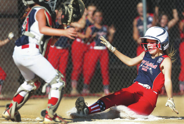 128761709_web1_mot_pa5_faa
Pittston Areas Isabella Kroski slides across home plate for an inside-the-park home run as Delaware catcher Gia Gambino waits for the ball in the second inning of a Little League 8-10 Softball Eastern Regional game Wednesday at the Mountain Top Little League.
Fred Adams | For Times Leader