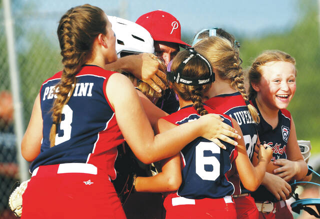 <p>Pittston Area Little League players celebrate their third straight win at the 8-10 Eastern Regionals after edging Rhode Island champion Cranston Western in Thursday’s winner’s bracket finals.</p>
<p>Fred Adams | For Times Leader</p>