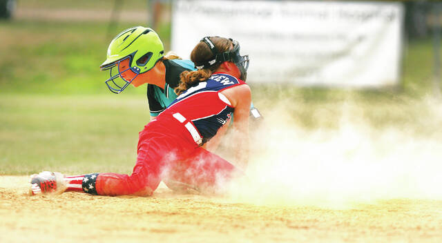 <p>Pittston Area shortstop Natalie McAndrew tags out Cranston Western’s Isabella Marcano in the second inning on Thursday.</p>
<p>Fred Adams | For Times Leader</p>