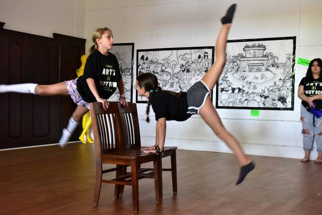 <p>Dance students Brooklyn Brdaric and Deena Connors perform Thursday during the Arts in Motion showcase that brought their summer arts camp at the ANNAMALY gallery in Forty Fort to a close.</p>
<p>Mark Guydish | Times Leader</p>