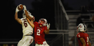 
			
				                                Hazleton Area wide receiver Connor Shamany (6) goes up to haul in a pass against tight coverage by Pittston Areas Kevin Lockett in the second quarter on Friday.
                                 Fred Adams | For Times Leader

			
		
