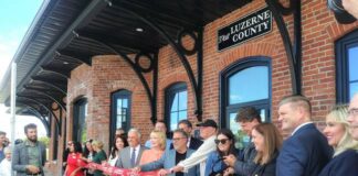 
			
				                                Community and government leaders lined up Thursday for a formal ribbon-cutting at Luzerne Countys tourism office in the historic former train station in downtown Wilkes-Barre.
                                 Jennifer Learn-Andes | Times Leader

			
		