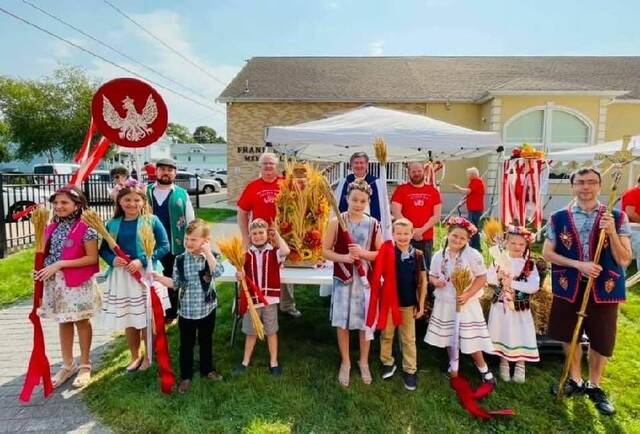 128874094_web1_Dozynki-Participants-in-ceremony
Young people wearing ethnic costumes took part in a previous Dozynki Harvest Festival at Holy Mother of Sorrows Church in Dupont.
Submitted photo