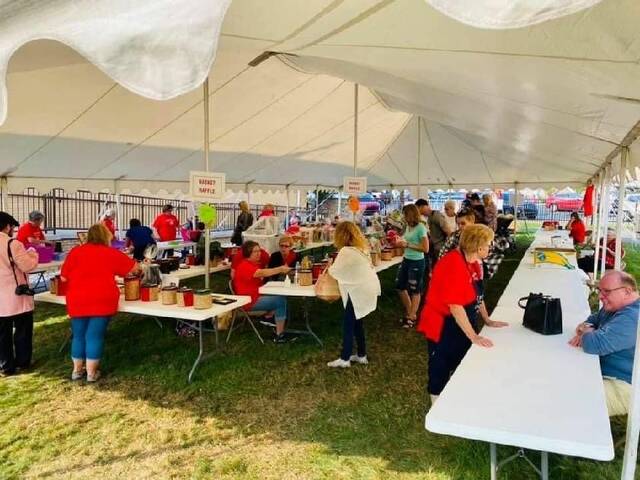 <p>Festival goers admire the baskets on display at the basket raffle during a previous Dozynki Harvest Festival.</p>
<p>Submitted photo</p>