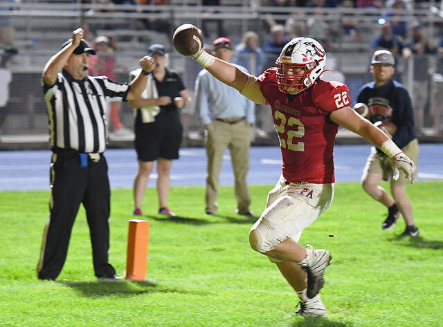 128874170_web1_PA-WVW-Ftbl-5
Pittston Areas Drew Menendez scores on a 7-yard pass from Drew DeLucca the third quarter. It was the Patriots first second-half score of the season and lifted the team to the win.
Tony Callaio | For Times Leader