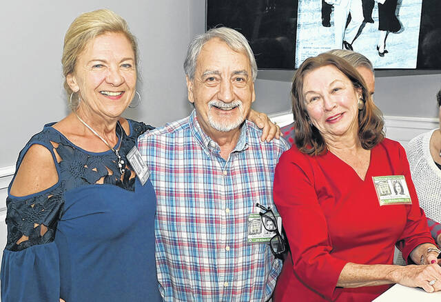 <p>Posing for a photo are 1966 classmates are, left to right: Cecelia Marie Chiampi Williams, Gregory Shiner, Ellen Moss Quinn.</p>
<p>Tony Callaio | For Sunday Dispatch</p>