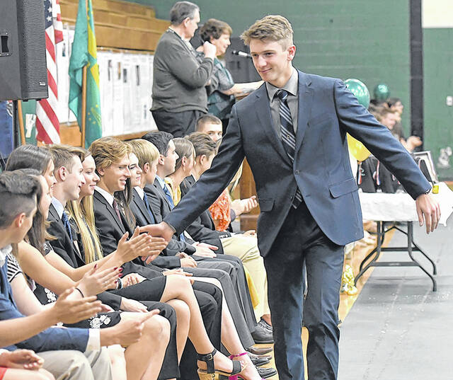 128895942_web1_WA-Scholarship-Celebration-1
Aaron Zezza congratulates all of his fellow classmates after he received the Wyoming Area Student Council scholarship in 2018.
Tony Callaio file photo