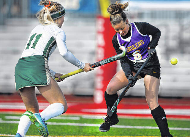 <p>Wyoming Area’s Alexys Moore shoots the ball past Boiling Springs’ Kate Yenser during the PIAA Class A field hockey championship game on Saturday.</p>
<p>Fred Adams | For Sunday Dispatch</p>