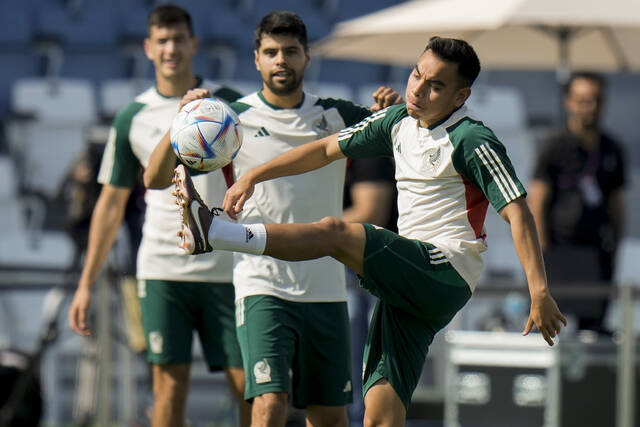 <p>Carlos Rodriguez, front, kicks a ball during Mexico official training on the eve of the group C World Cup soccer match between Argentina and Mexico, in Jor , Qatar, on Friday.</p>
<p>AP photo</p>