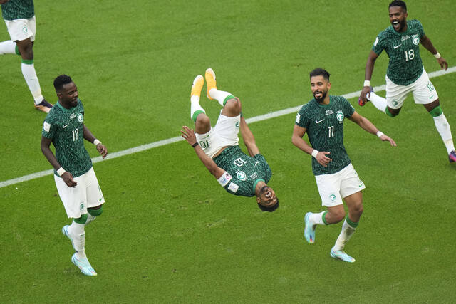 <p>Saudi Arabia’s Salem Al-Dawsari, second left, celebrates after scoring his side’s second goal during the World Cup group C soccer match between Argentina and Saudi Arabia at the Lusail Stadium in Lusail, Qatar, on Tuesday.</p>
<p>AP photo</p>