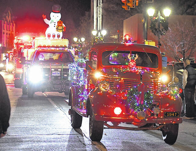 <p>This photo from the 2021 City of Pittston Toy Truck Christmas parade is shown traveling north on Main St., where hundreds lined Main St. waiting for the arrival of Santa Claus.</p>
<p>Tony Callaio file photo | For Sunday Disaptch</p>