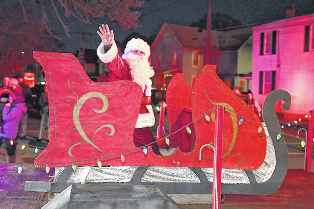 <p>Santa Claus arrived at West Pittston in style on his sled during the annual Santa parade.</p>
<p>Tony Callaio | For Sunday Dispatch</p>