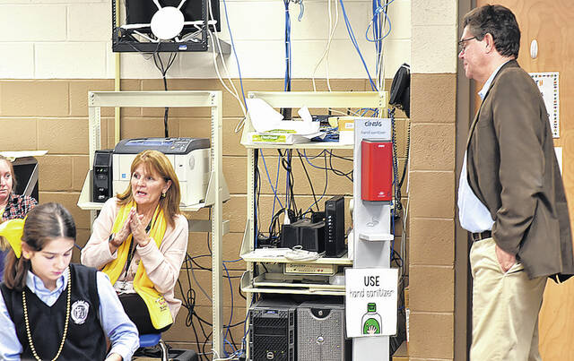<p>Toni Griseto, left, math and religion teacher for grades six through eight, offered comments on her experiences of the Agnes flood.</p>
<p>Tony Callaio | For Sunday Dispatch</p>