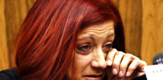 
			
				                                Luzerne County Election Board member Alyssa Fusaro is seen in tears during Tuesdays county council meeting, insisting there is no truth to accusations she used a racial slur or profanity against election bureau workers.
 
			
		