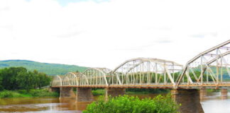 
			
				                                The Firefighters Memorial Bridge is seen from the Pittston side of the Susquehanna River in this file photo. An inspection initiated by Luzerne County Council has concluded the bridge linking West Pittston and Pittston can safely reopen to traffic at a reduced weight limit until a bridge replacement project commences in coming years.
                                 Times Leader file photo

			
		