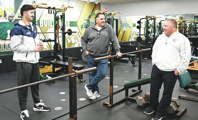 129246393_web1_Dominic-DeLuca-PSU-Scholarship-2
Penn State scholarship recipient Dominic DeLuca, far left, and his father Carl DeLuca, center, talk football to Wyoming Area football head coach Randy Spencer. Spencer and DeLuca took part in the 2019 Wyoming Area State football Championship at Hershey.
Tony Callaio | For Sunday Dispatch