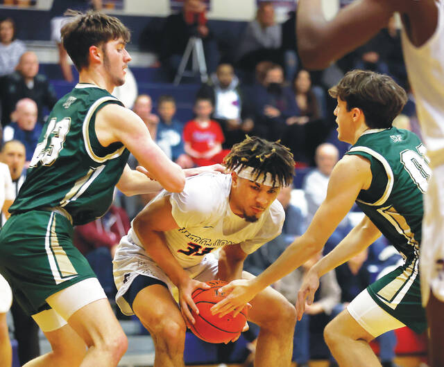 129389881_web1_wy_na5_faa
Nanticoke Areas Jaidyn Johnson is defended by Wyoming Areas Dane Shutter (left) and Tyler Sciandra during the second quarter Thursday night. Johnson, who led WVC Division 2 in scoring, finished with a game-high 32 points.
Fred Adams | For Times Leader