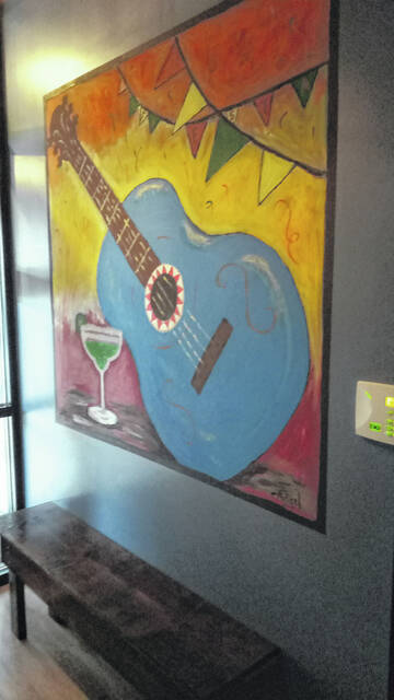 129526254_web1_IMG_20230221_154742
A painting, done by BRAVO-Tex-Mexs co-owner Angel Rosales, in the restaurants vestibule.
Ben Fred | For Sunday Dispatch