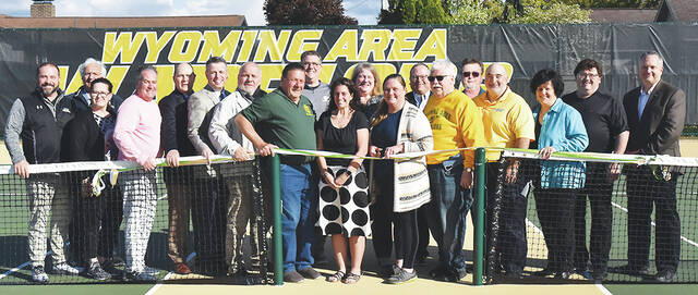 129658872_web1_WA-Tennis-Court-Ribbon-Cutting-1--1-
Wyoming Area (WA) recently held a ribbon-cutting ceremony upon the completion of the newly reconstructed tennis courts on Boston Ave., West Pittston. Front row, left to right: Joe Pizano, WA athletic director, Lori DeAngelo, Exeter Boro. council, John Morgan, Exeter Boro council, Jerry Champi, FNCB Bank, Mark Grochocki, Sen. Lisa Bakers office, Len Pribula, WA school board, Nick DeAngelo, WA school board, Tiffany Callaio, former WA tennis coach, Lara Best, WA school board president, Joe Kopko, WA school board, Dave Alberigi, WA school board, Toni Valenti, WA school board, Michael Bugeholl, WA facilities director, Michael Cummings, FNCB Bank. Back row: Tony Callaio, former WA tennis coach, Jon Pollard, WA superintendent, Louise Balbach, FNCB Bank, James Bone, FNCB Bank, Dave Balent, Exeter Boro council. Absent: Bill Roberts, current WA tennis coach. Tony Callaio | For Sunday Dispatch