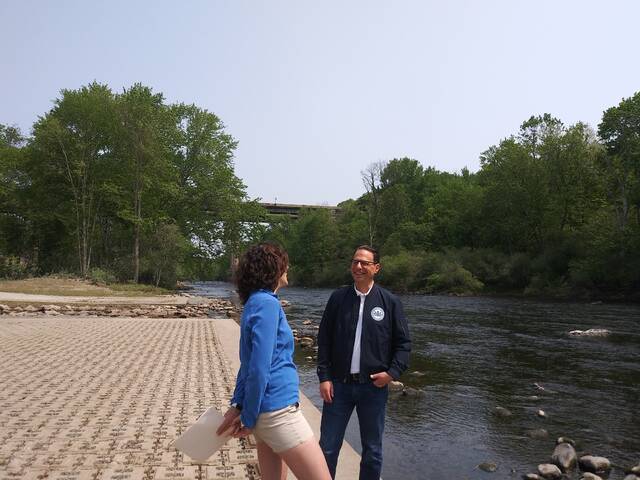 <p>Pennsylvania Gov. Josh Shapiro chats with Sierra Fogal, one of the owners of Pocono Whitewater and Pocono Biking, during Wednesday’s opening of a new public access point at the Lehigh Gorge State Park along the Lehigh River in White Haven.</p>
<p>Jennifer Learn-Andes | Times Leader</p>