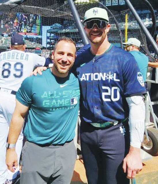 <p>New York Mets Strength and Conditioning Coach Dustin Clarke, left, stands with New York Mets first baseman Pete Alonso at the All-Star Game at Seattle.</p>
<p>Submitted photo</p>