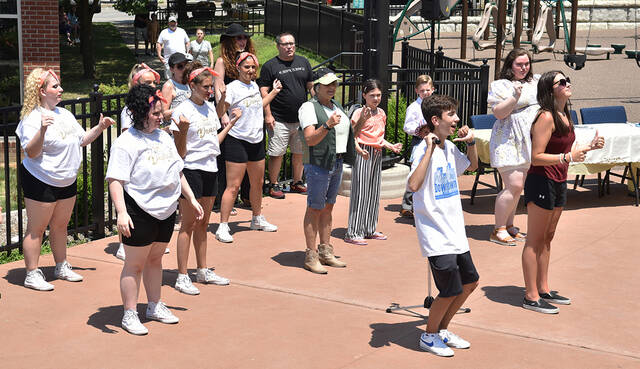 <p>At front, Pittston’s Day organizer Paul Stevenson, along side then co-host Giselle Dauchert, gets the crowd to participate in a dance at the start of PIttston’s Got Talent show at The Slope Amphitheater in 2022. This year, Day Downtown will be presented at Duryea Community Park on Saturday, July 29 at noon. Tony Callaio | For Sunday Dispatch</p>