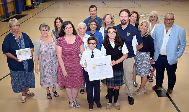 129894782_web1_WAC--80-Kindness-Award-1
The inaugural Wyoming Area Catholic (WAC) Class of 1980 Kindness Award was presented to current WAC students and siblings Emilia and Evan Jansoski in the memory of 1980 classmate Anthony Ristagno, who passed away in 1991. Shown in the photo are WAC Principal Eileen Rishcoff, far left, members of the WAC Class of 1980, members of the Ristagno family, Martha and Juliann Ristagno, and Emilia and Evans parents, Walt and Shannon Janoski.
Tony Callaio | For Sunday Dispatch