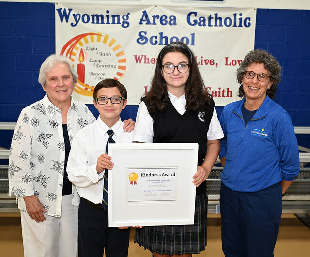 <p>The Wyoming Area Catholic Class of 1980 presented a first-ever Kindness Award in memory of classmate Anthony Ristagno. Left to right: Ristagno’s mother Martha, recipents Evan Janoski and Emilia Janoski, and Ristagno’s sister Juliann Ristagno.</p>
<p>Tony Callaio | For Sunday Dispatch</p>