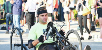 
			
				                                Handcyclist Michael McDonald of Dunmore is shown starting out on the 10-mile race, his first-ever, during the inaugural Wyoming Valley Run.
                                 Tony Callaio | For Times Leader

			
		