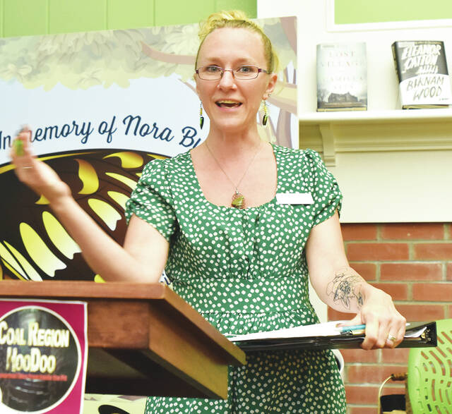 <p>Kendra-lee O’Brien, West Pittston Library adult program coordinator, introduces Maxim W. Furek, author of ‘Coal Region HooDoo - Paranormal Tales from Inside the Pit,’ and ‘Sheppton: The Myth, Miracle & Music,’ the subjects of his talk at the library on Thursday.</p>
<p>Tony Callaio | For Times Leader</p>