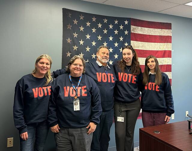 <p>Luzerne County officials involved in elections wore matching vote sweatshirts (not purchased with public funds) on Election Day. From left, are: county Administrative Services Division Head Jennifer Pecora, county Manager Romilda Crocamo, county Chief Solicitor Harry W. Skene, county Deputy Election Director Emily Cook and county Election Director Eryn Harvey.</p>
<p>Jennifer Learn-Andes | Times Leader</p>