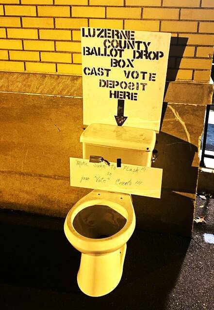 <p>In Luzerne borough, a toilet was posted outside a polling place telling people to deposit their mail ballots inside and make sure they flush. The toilet and sign were removed Monday night, and police are investigating, officials said.</p>