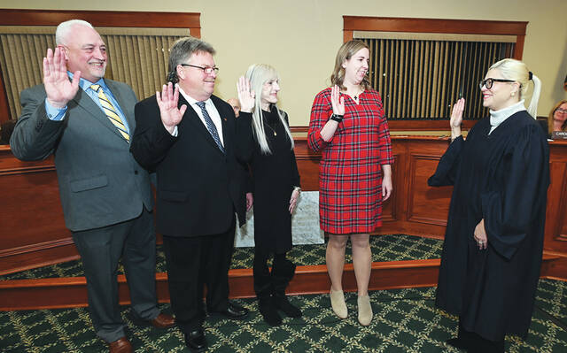 130275996_web1_Duryea-Swear-in
District Magistrate Alexandra Kokura Kravitz, right, had the honor of swearing in Duryea Borough officials during the reorganization meeting on Tuesday, Jan. 2. Left to right: Eugene Marriggi, council, Michael McGlynn, council, Anissa Akulonis, tax collector, Allison Brudzinski, council, Kokura Kravitz.
Tony Callaio | For Sunday Dispatch