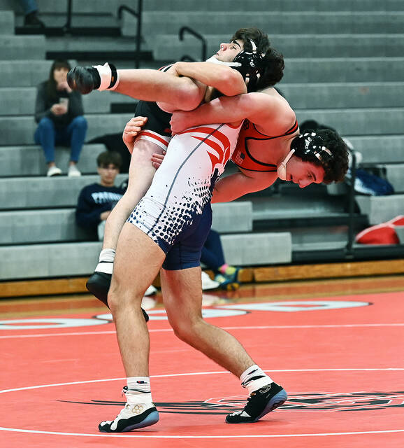 130295351_web1_PA-Crestwood-172
After a slow start, Pittston Areas Matteo Carabetta lifts his Crestwood opponent Logan Rolles off the mat. Carabetta took the match in three periods 11-6.
Tony Callaio | For Sunday Dispatch
