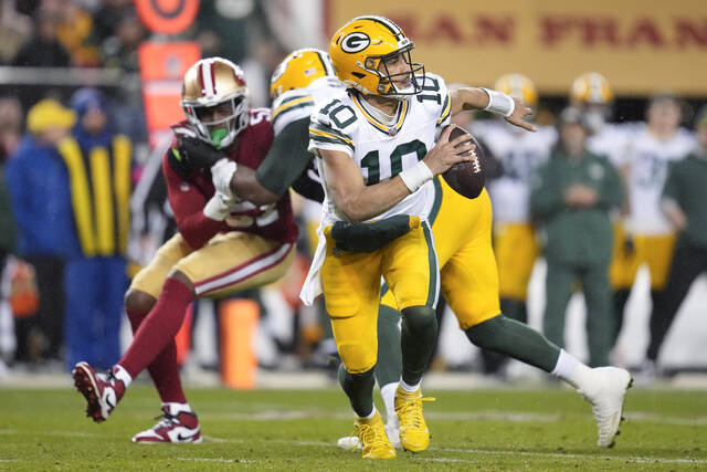 130319388_web1_130319388-427fd2e0d7a44d7295977775675a85c0
Green Bay Packers quarterback Jordan Love rolls out of the pocket during the second half of an NFC divisional playoff game against the San Francisco 49ers on Saturday in Santa Clara, Calif.
AP photo