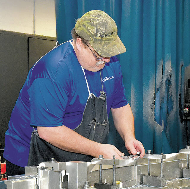 130348012_web1_Ashley-Machine-NEPA-Alliance-3
Andy Novak is shown carefully measuring the thickness of an aluminum part designated for a Boeing 767 aircraft manufactured at Ashley Machine & Tool Co., West Wyoming.
Tony Callaio | For Times Leader