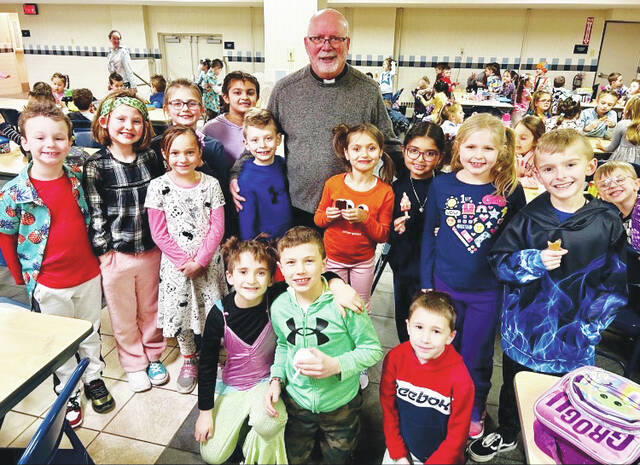 130367037_web1_image_6487327
Rev. Michael Bryant pastor of Nativity Of Our Lord Parish treated the students of Holy Rosary School to ice cream for Catholic Schools Week . Pictured are: First row, from left: Frankie Isidori, Jonah Ferranti, Dominic Consulmagno. Second row: Zachary Gromelski, Isla Kaminsky, Grace Gonski, Carmen Lambert, Rev. Michael Bryant, Amelia Schultz, Leyla Guzman, Lilyana Piechota, Mac Phillips, Harrison Lukasavage. Third row: Kinsley Brown and Keira Chludzinski.